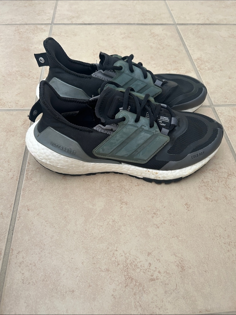 Adidas Ultraboost 22 Cold.RDY running shoes in a black and grey colorway